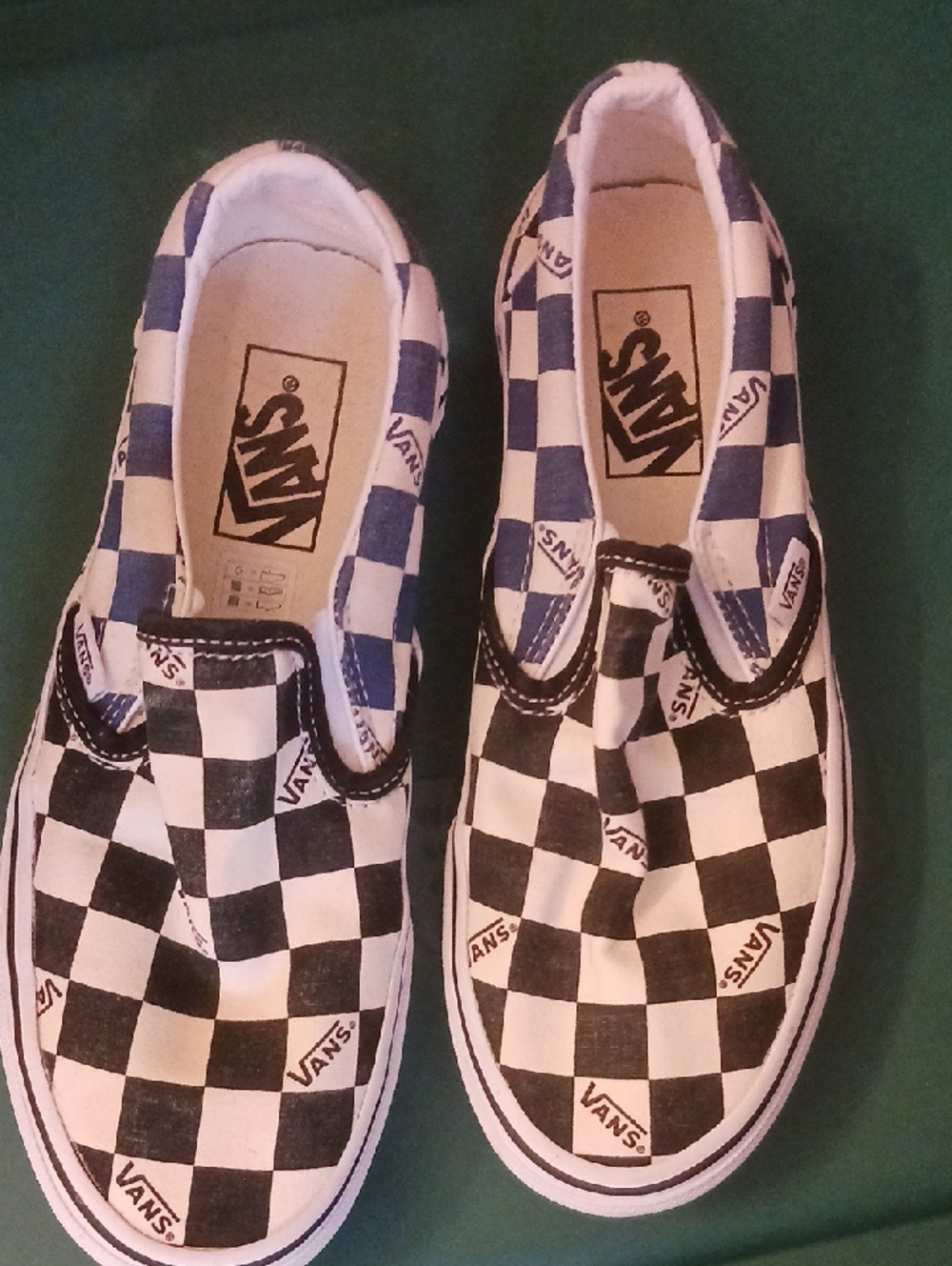 Vans Checkerboard Slip-On Sneakers in Black and White